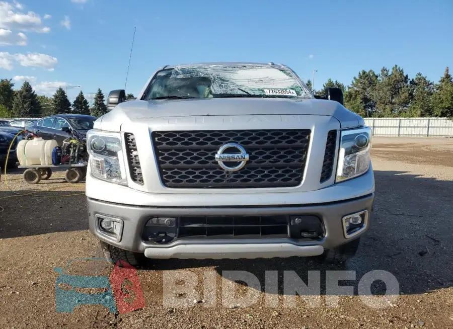 1N6AA1E52JN551107 Photo# 5