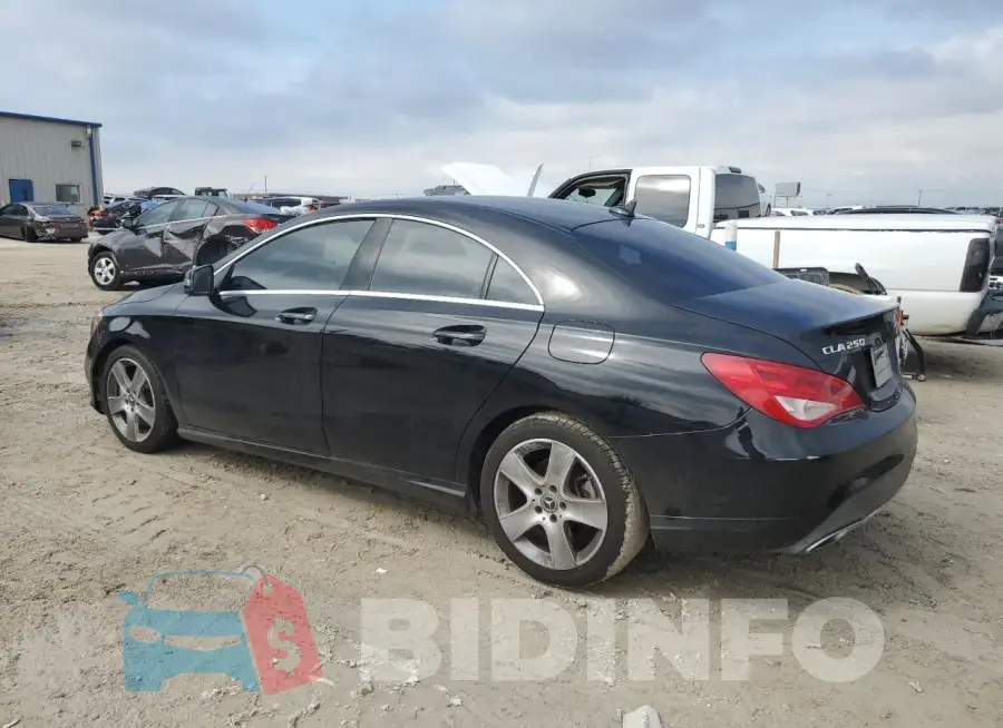 WDDSJ4EB0JN610921 Photo# 2
