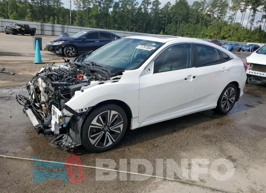 19XFC1F30GE001515 Photo# 1
