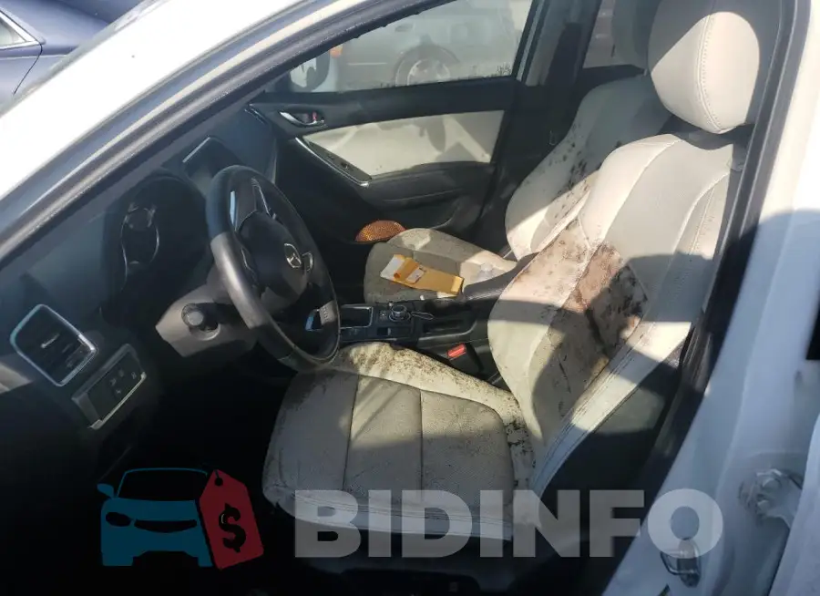JM3KE2DY5G0898554 Photo# 7