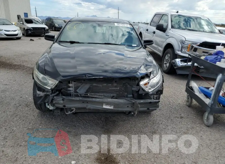 1FAHP2E85KG110034 Photo# 5