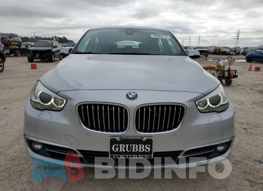 WBA5M2C59FGH99130 Photo# 5