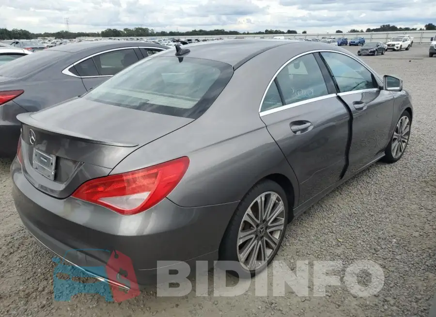 WDDSJ4EB6JN627710 Photo# 3