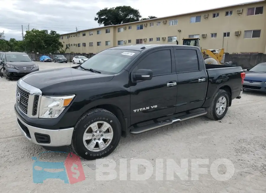 1N6AA1EK7JN542912 Photo# 1
