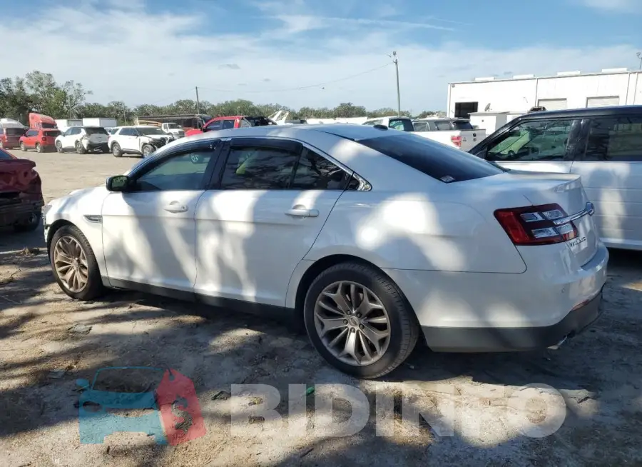 1FAHP2F8XGG149899 Photo# 2