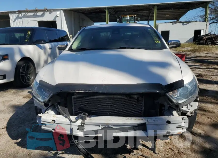 1FAHP2F8XGG149899 Photo# 5