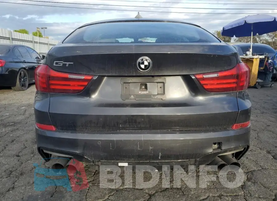 WBA5M2C58FGH99054 Photo# 6