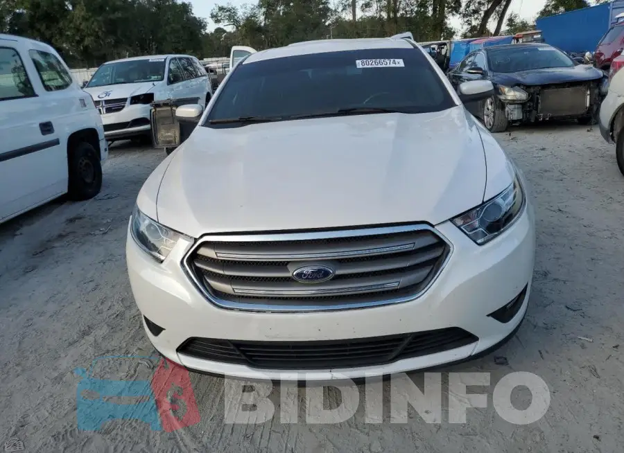 1FAHP2E82KG114879 Photo# 5