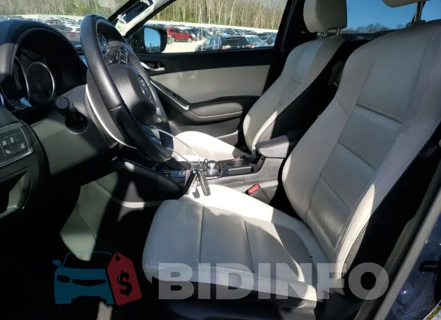 JM3KE4DY3G0909515 Photo# 7