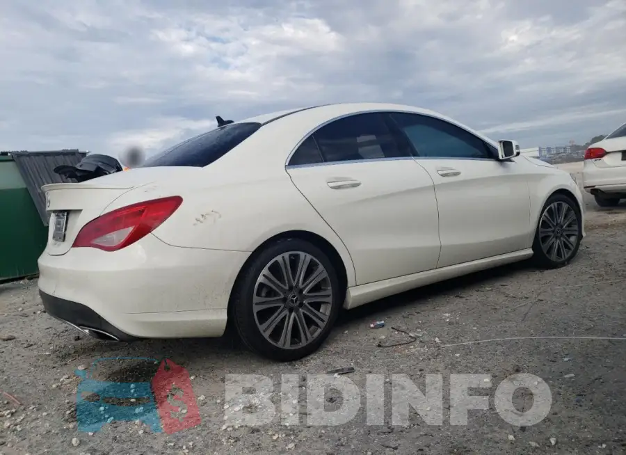 WDDSJ4EB1JN562863 Photo# 3