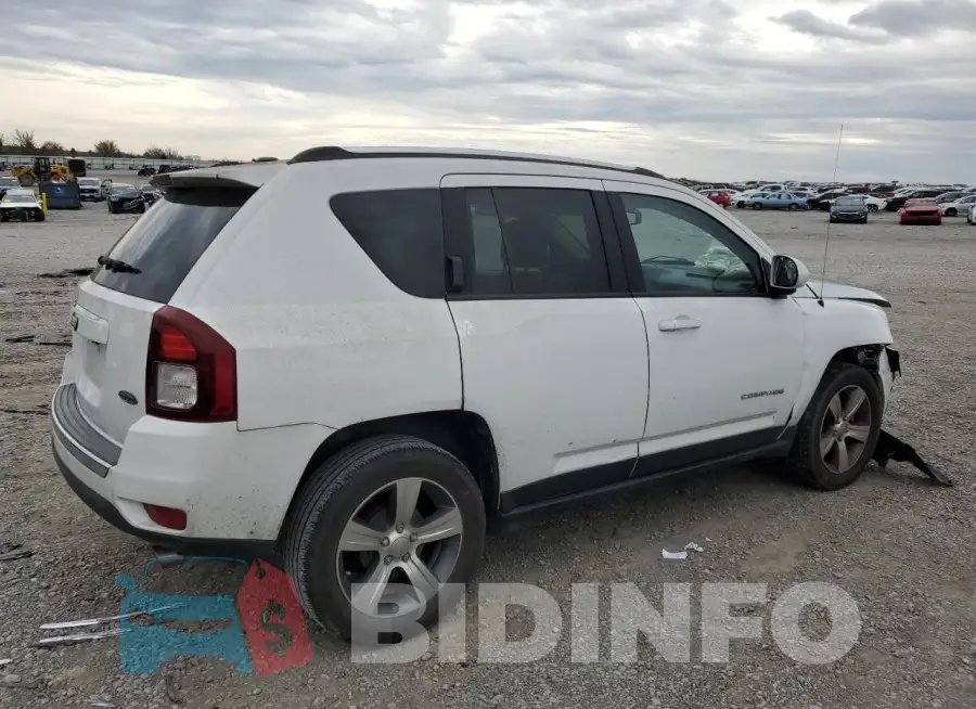 1C4NJCEA7GD636813 Photo# 3