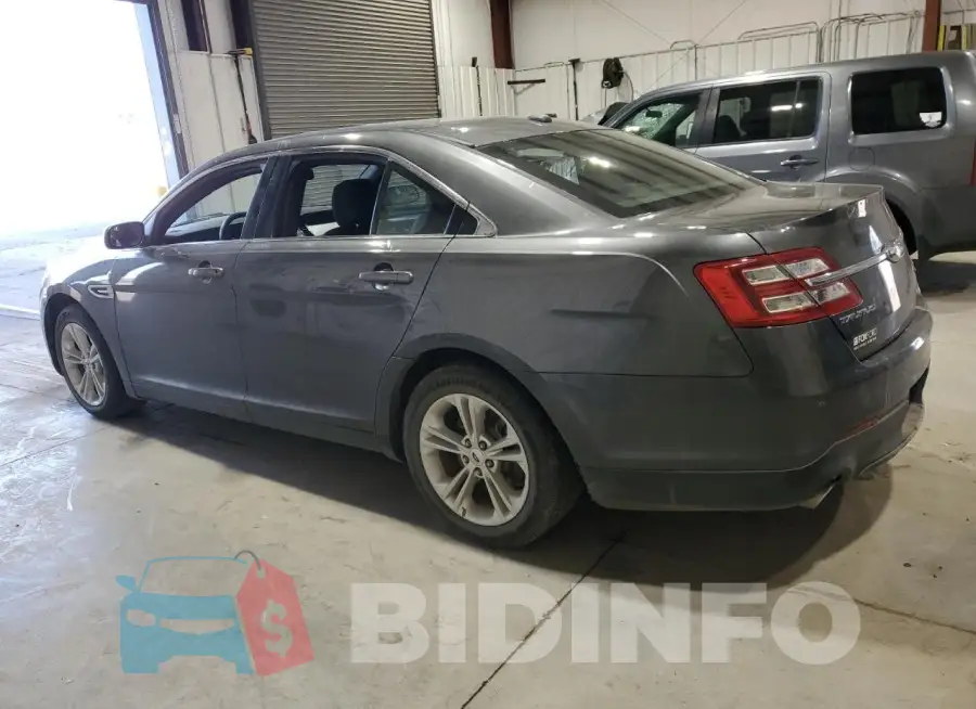 1FAHP2E86JG115077 Photo# 2