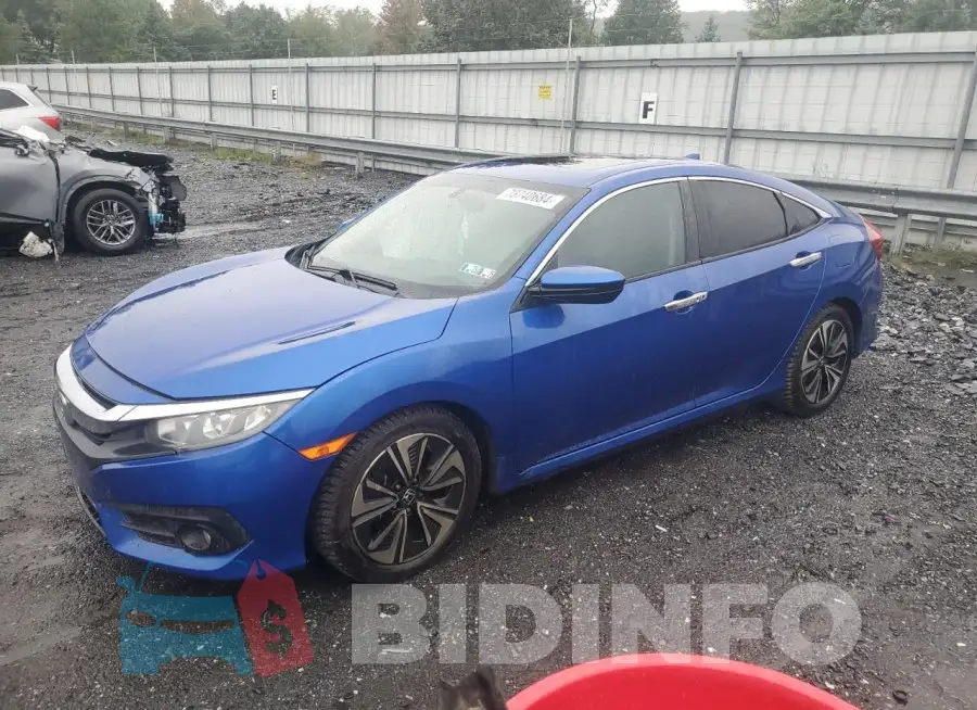 19XFC1F77HE214918 Photo# 1