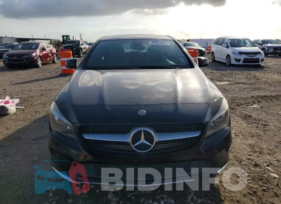 WDDSJ4EB4JN615703 Photo# 5