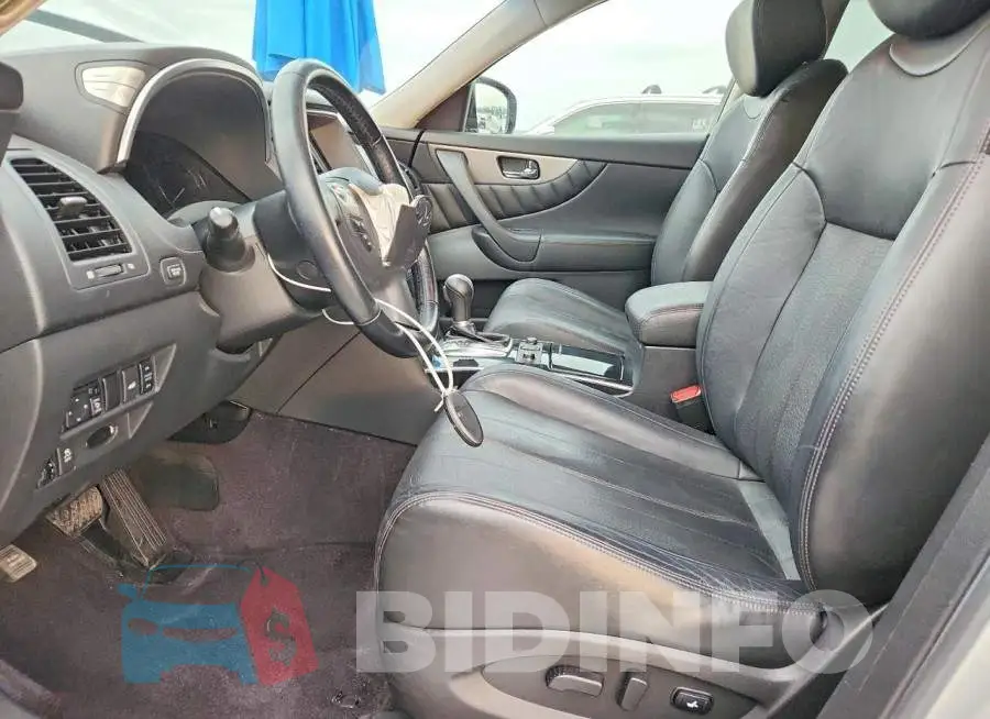 JN8CS1MUXHM141502 Photo# 7