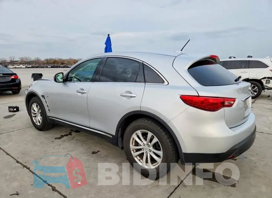JN8CS1MUXHM141502 Photo# 2