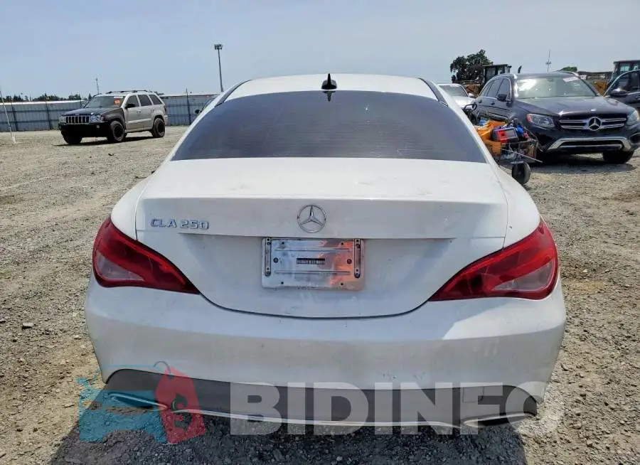 WDDSJ4EB0JN639898 Photo# 6