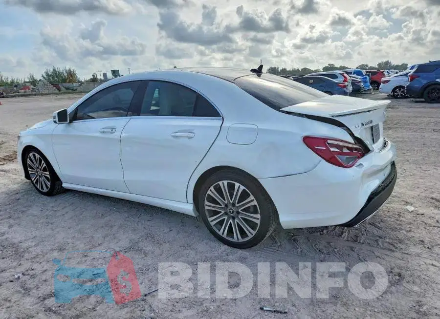 WDDSJ4EB2JN669825 Photo# 2