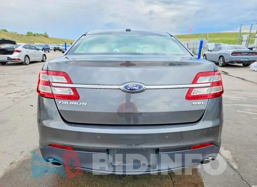 1FAHP2E88JG136335 Photo# 6