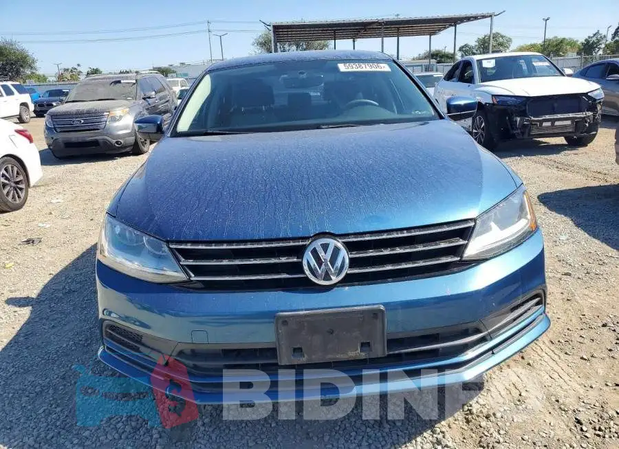 3VW2B7AJ1HM373704 Photo# 5