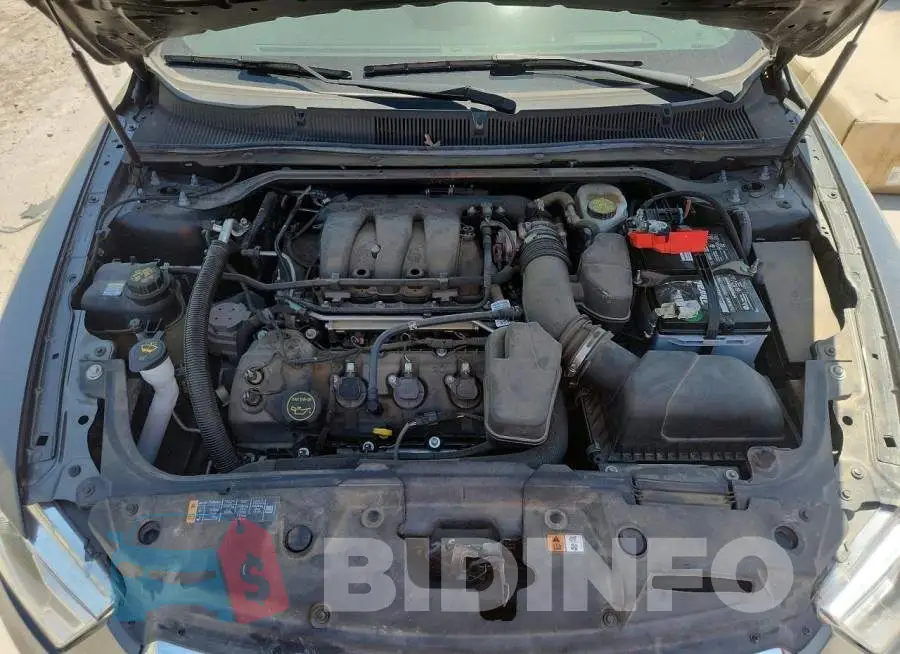 1FAHP2F8XJG138828 Photo# 11