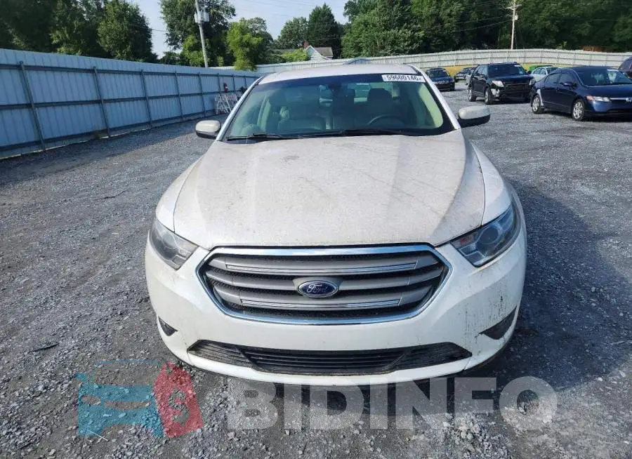 1FAHP2E81JG108764 Photo# 5