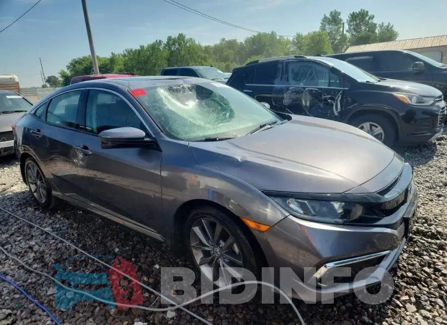 19XFC1F34ME011587 Photo# 4