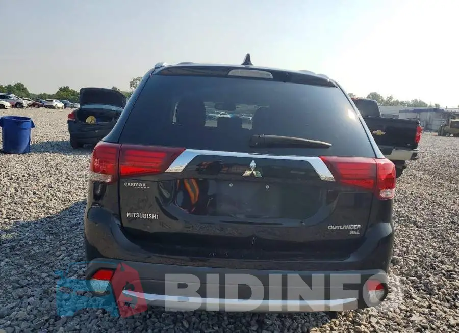 JA4AD3A36JZ011787 Photo# 6