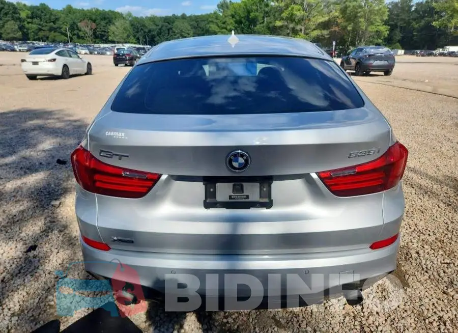 WBA5M4C3XHD187174 Photo# 6