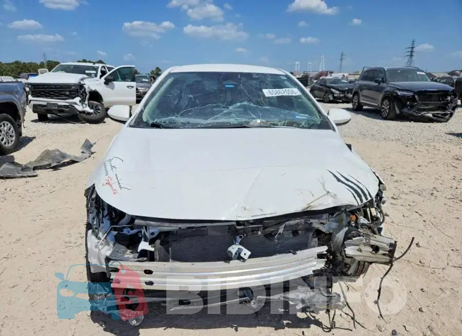 JTDBCMFE9R3059649 Photo# 5