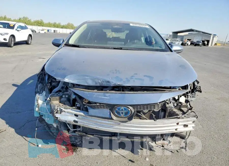 JTDBCMFE7R3068544 Photo# 5