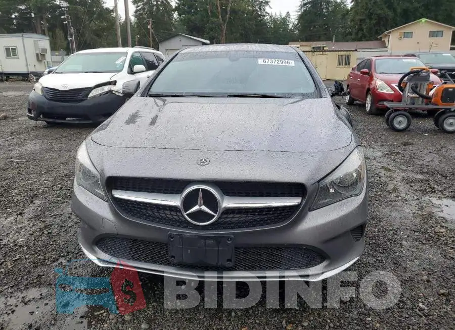 WDDSJ4EB7JN695112 Photo# 5