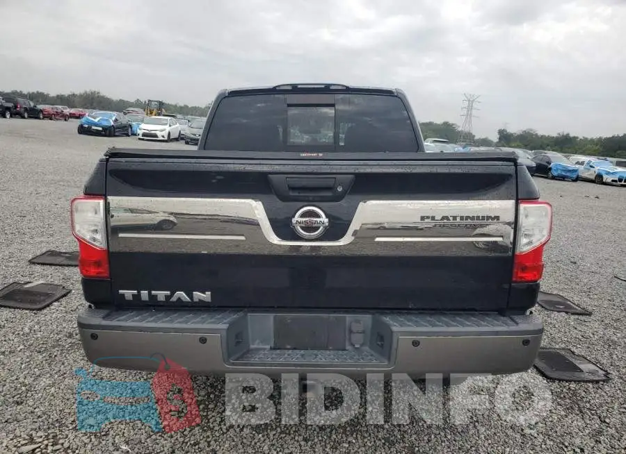 1N6AA1E60JN502044 Photo# 6