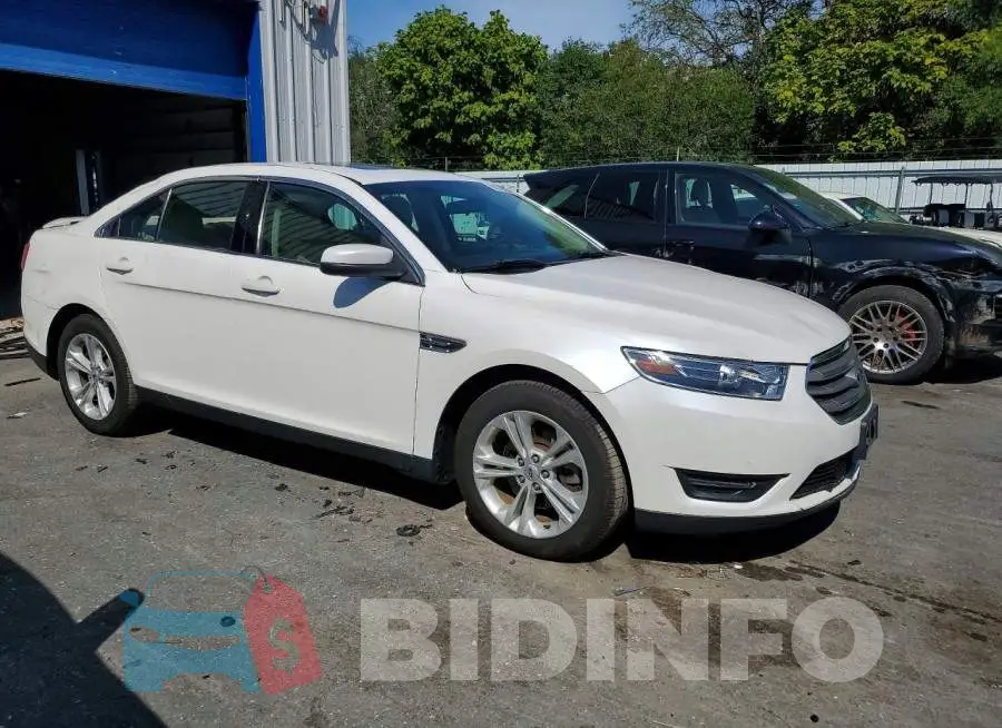 1FAHP2E84KG107304 Photo# 4