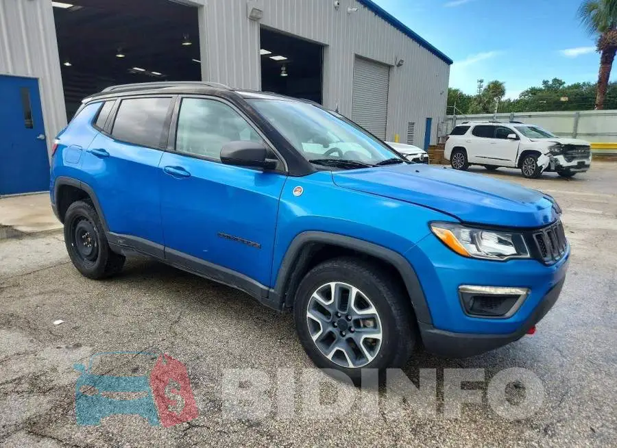 3C4NJDDB3LT223615 Photo# 4
