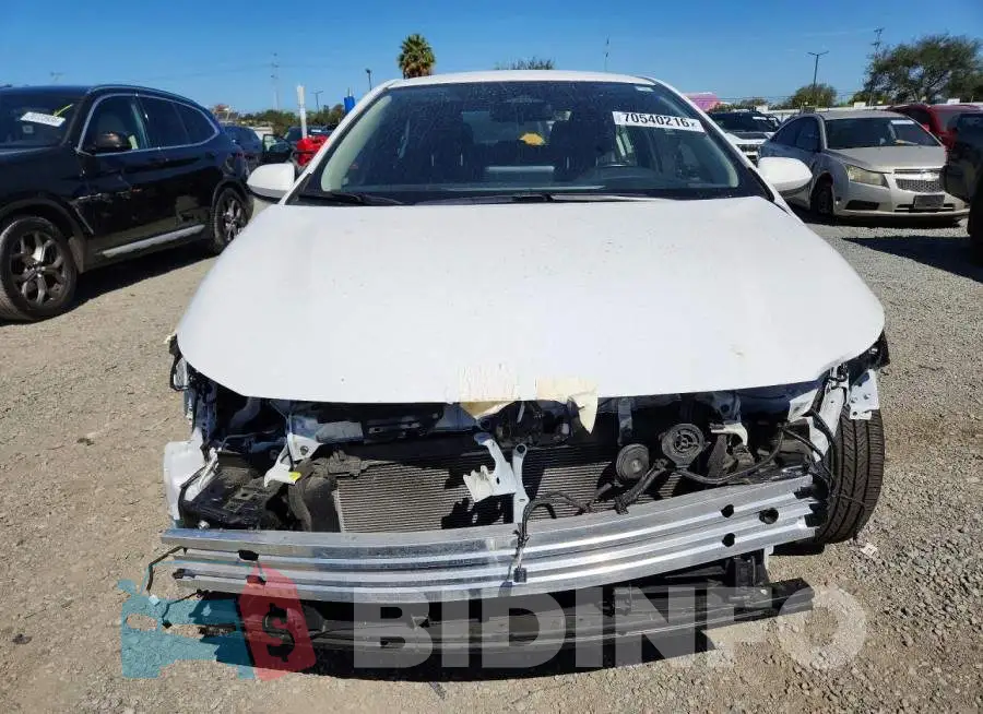 JTDBCMFE2S3109491 Photo# 5