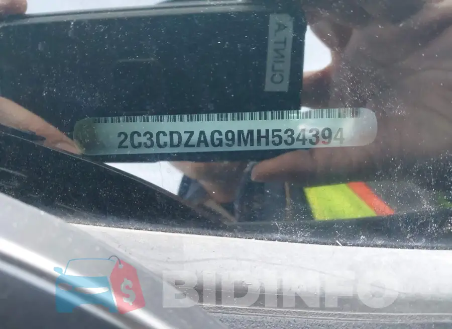 2C3CDZAG9MH534394 Photo# 9