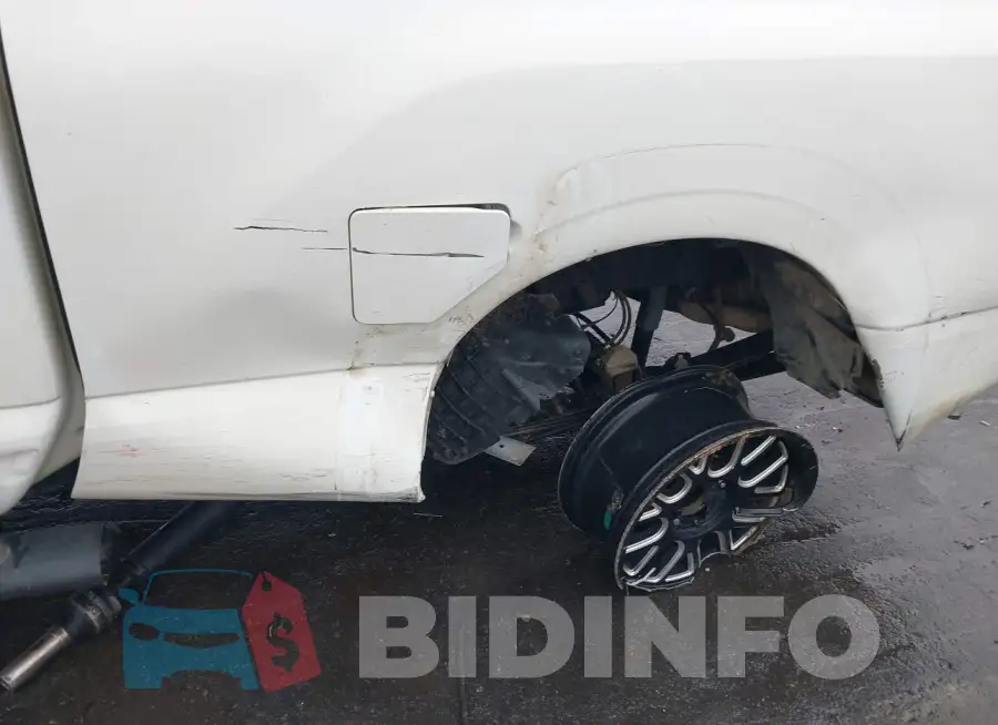 1N6AA1F37JN515152 Photo# 6