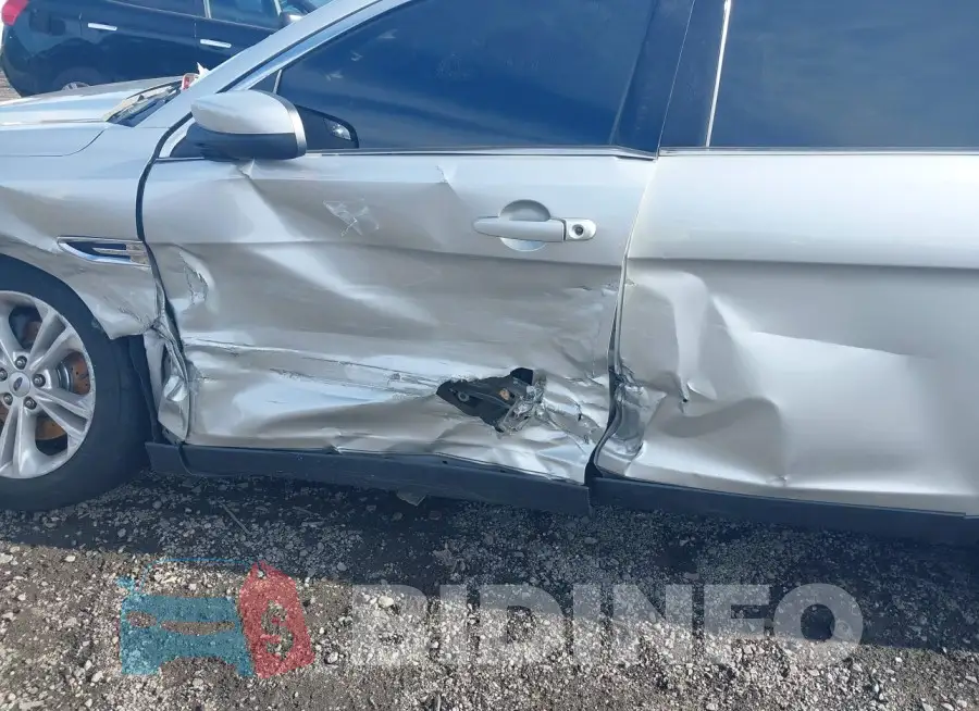 1FAHP2E81EG157307 Photo# 6