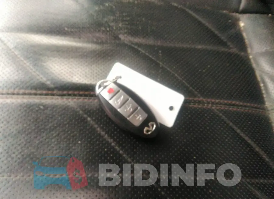 JN8CS1MW4GM751850 Photo# 11