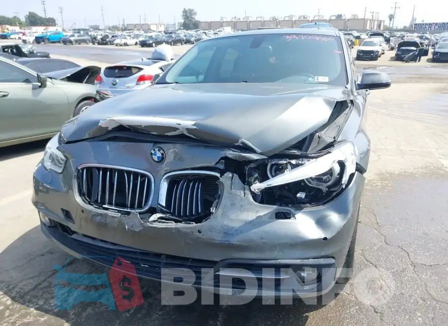 WBA5M2C55FGH99142 Photo# 6