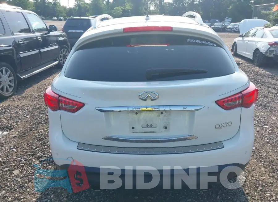 JN8CS1MWXFM480730 Photo# 16