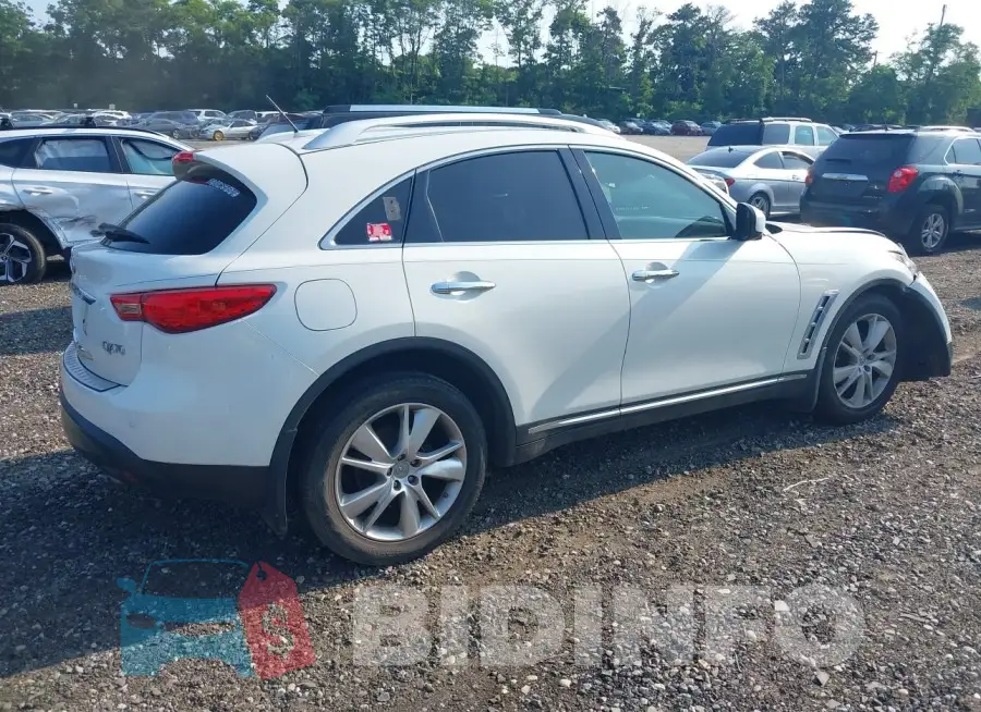 JN8CS1MWXFM480730 Photo# 4