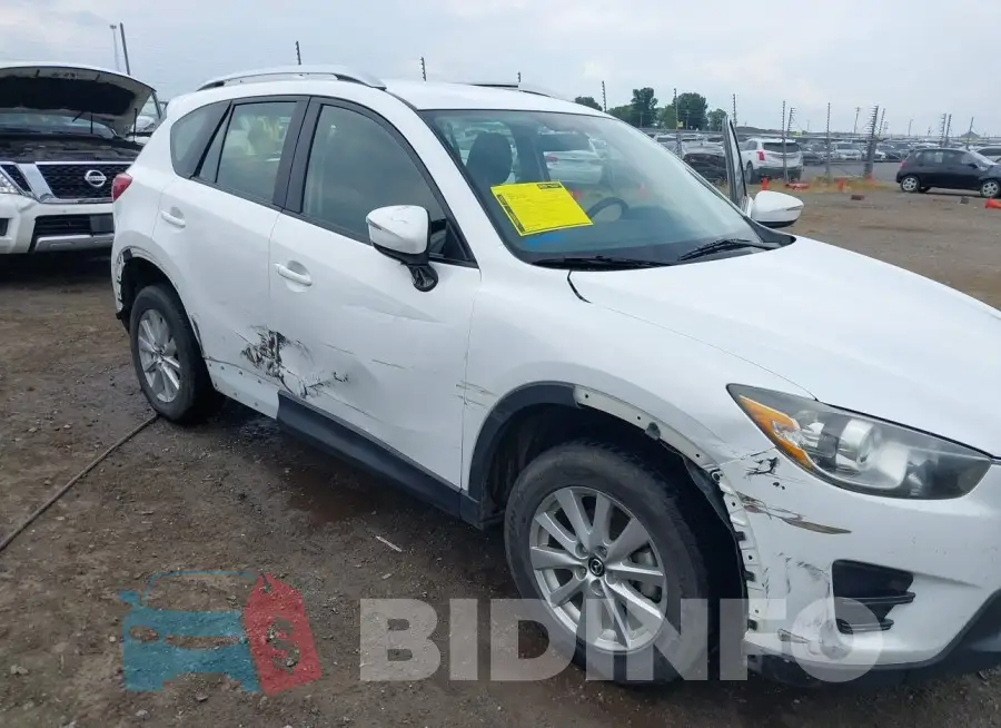 JM3KE2BY6G0702995 Photo# 6