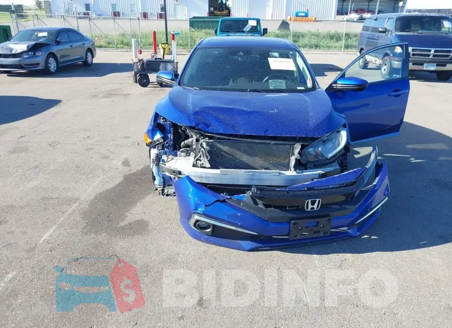 2HGFC1F34MH703483 Photo# 6