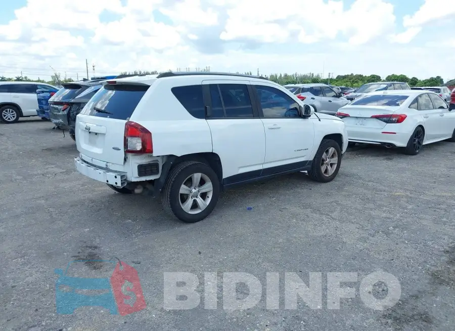 1C4NJCEA9GD628227 Photo# 4