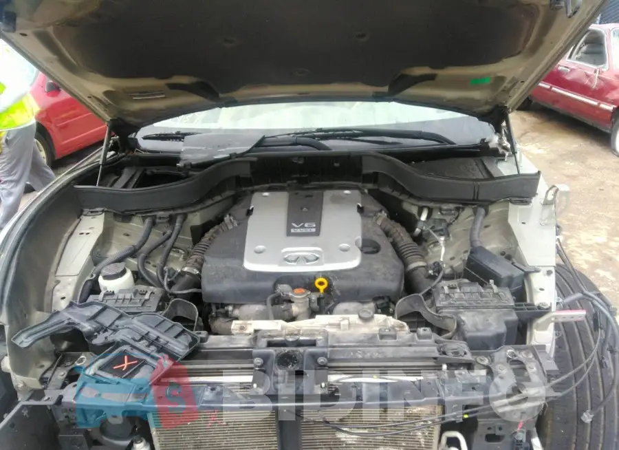 JN8CS1MWXEM411891 Photo# 10