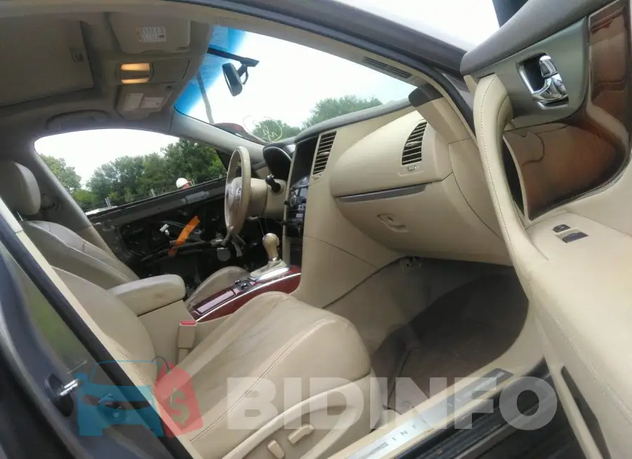 JN8CS1MWXEM411891 Photo# 5