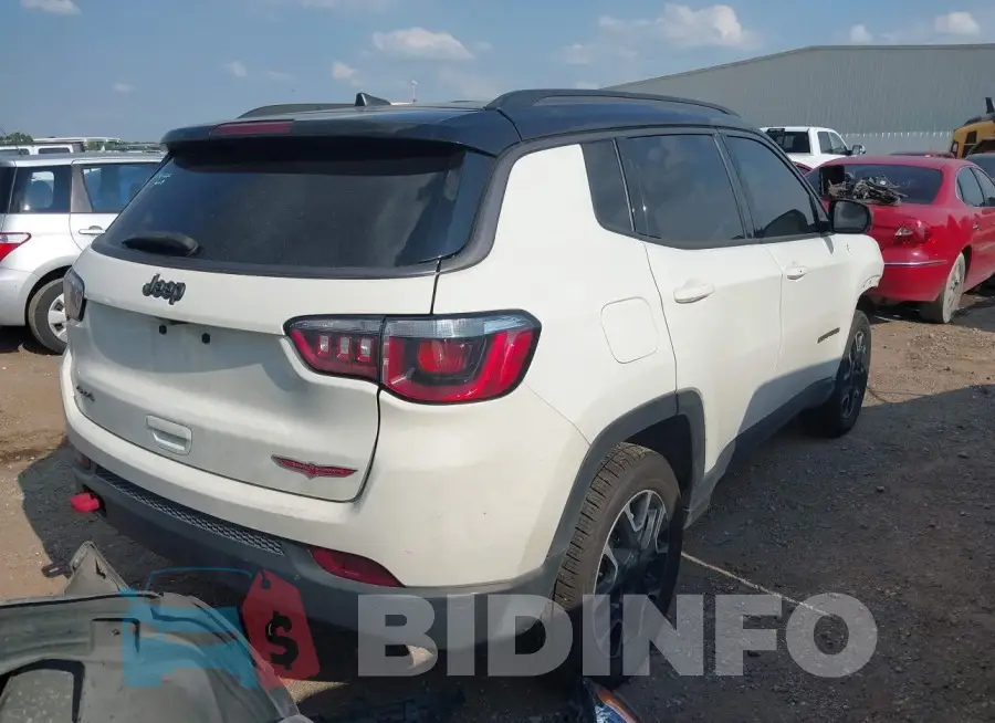 3C4NJDDB2LT171393 Photo# 4
