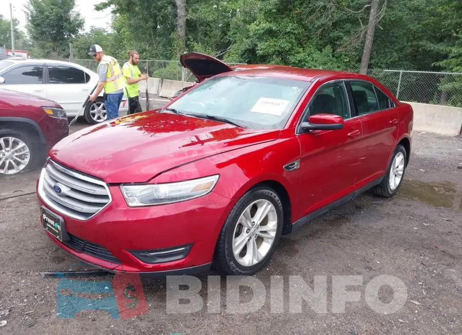 1FAHP2E85EG130708 Photo# 2